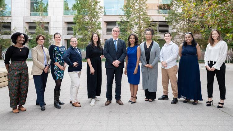 Nine recipients of the 2022 UCSF Chancellor Awards for Diversity pose with UCSF Chancellor Sam Hawgood and assistant vice chancellor and chief of staff in the Office of Diversity and Outreach Alejandra Rincón.